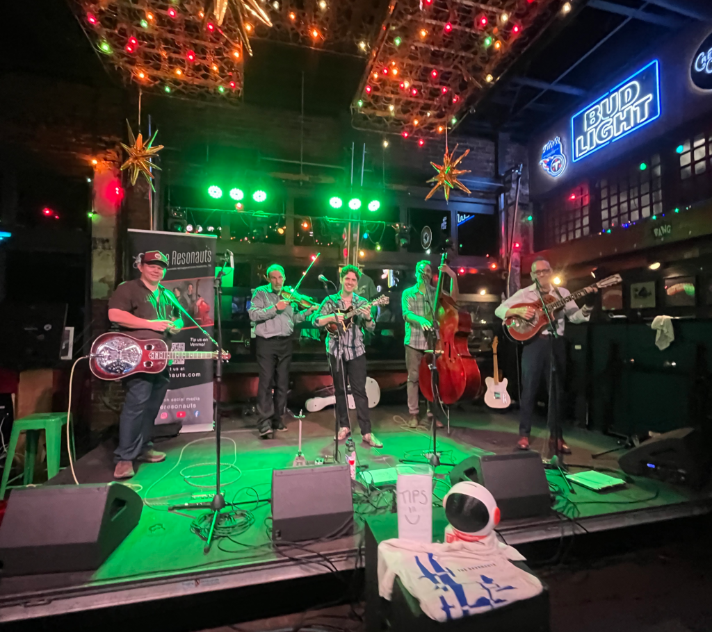 The Resonauts standing on stage at Hi-Fi Clyde's